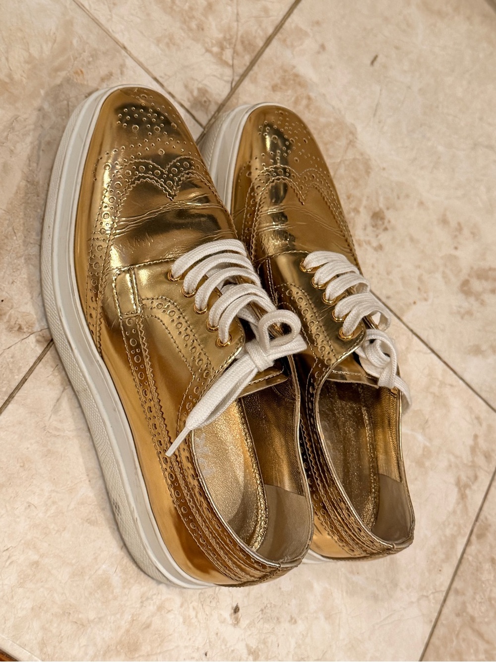 Prada Metallic Gold Wingtip Sneakers with White Laces